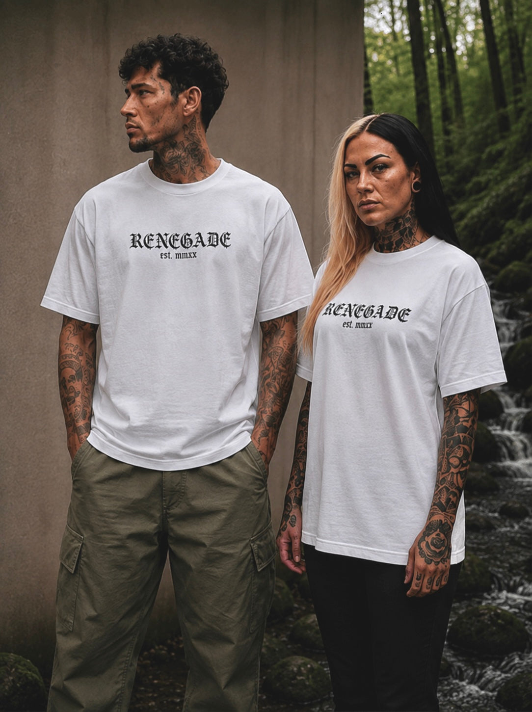 Male and female models wearing white Renegade gothic logo T-shirts in a woodland setting