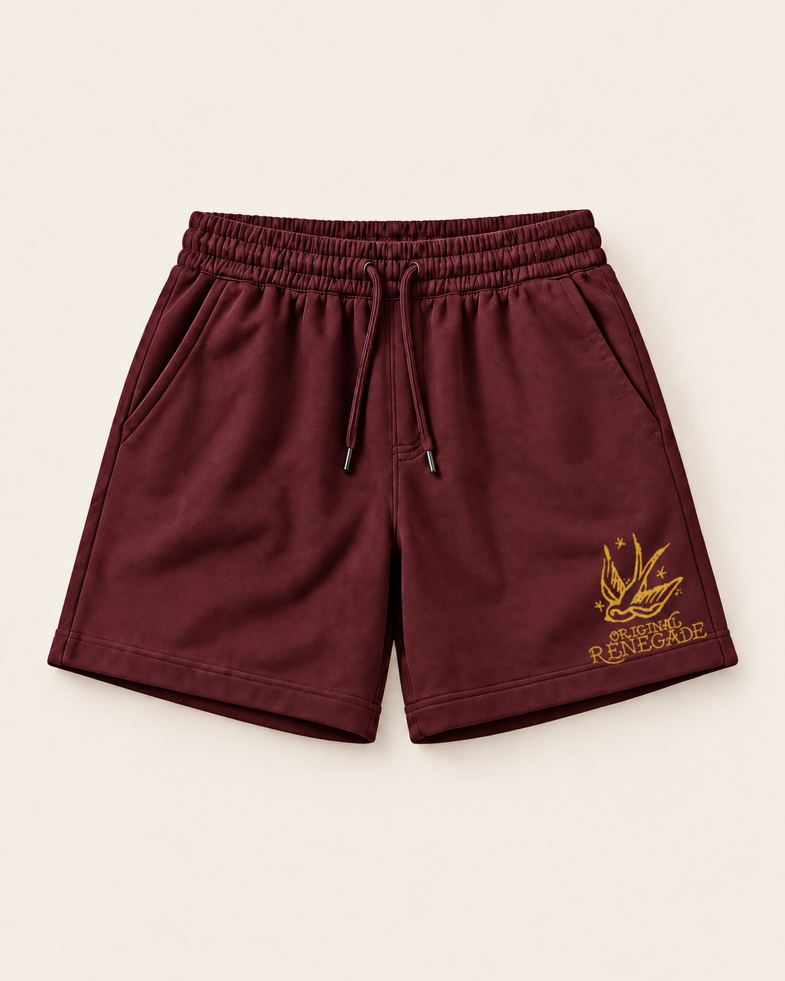 Maroon relaxed fit shorts with mustard Original Renegade swallow print, front view