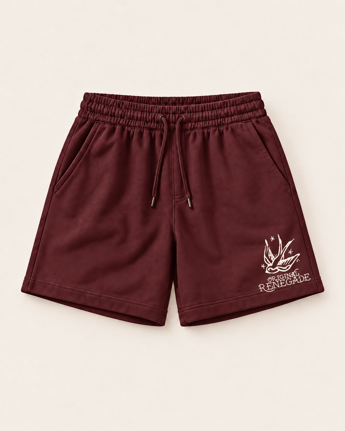 Maroon relaxed fit shorts with off-white Original Renegade swallow print, front view