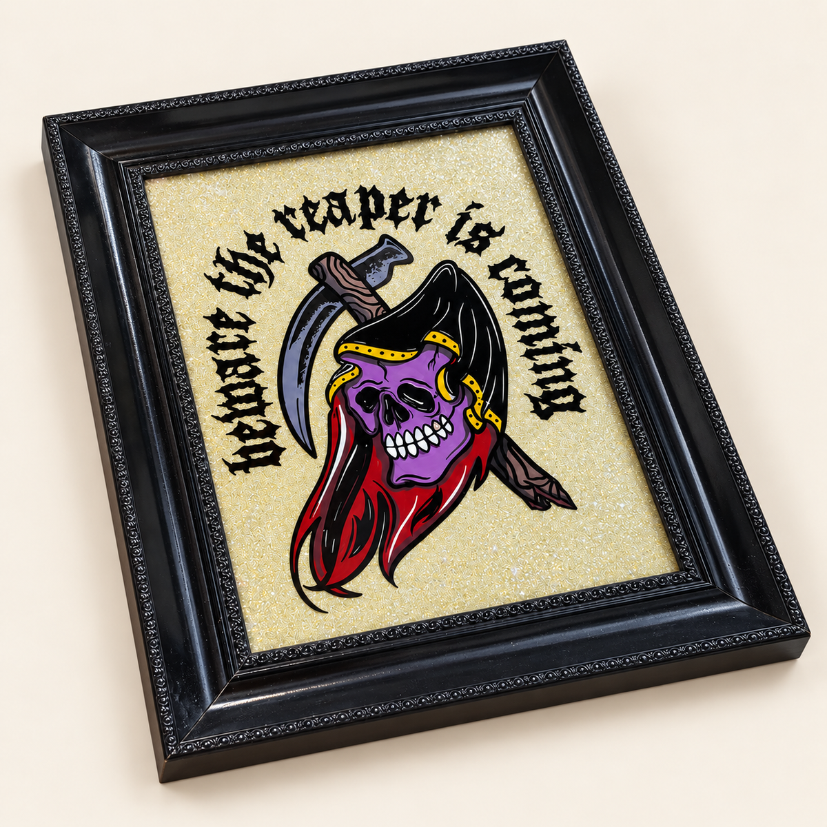 Angled view of the one-of-one Big Reaper original painting showing the gold glitter finish and ornate black frame