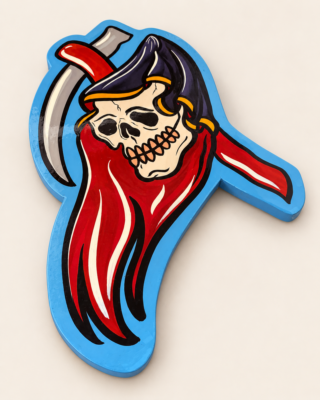 Angled view of Reaper wall art showing the hand-painted enamel finish and blue MDF edge