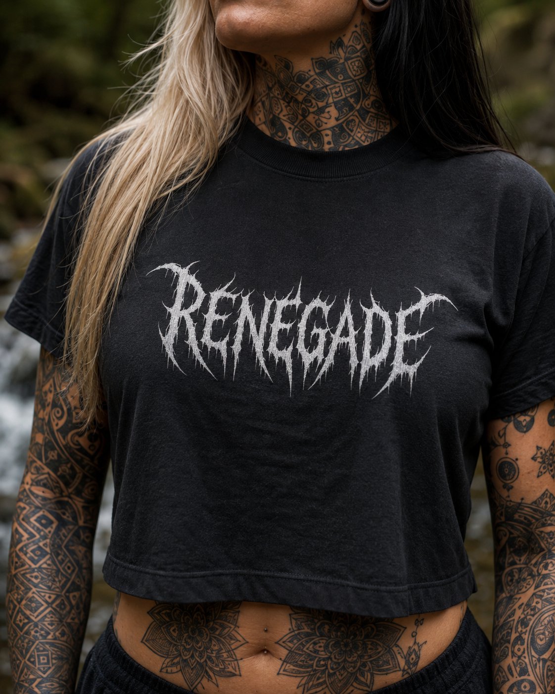 Close-up of white Renegade deathcore logo print on black cropped tee