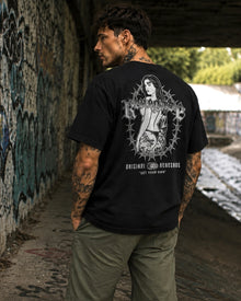 Trouble black heavyweight graphic tee back print underpass lifestyle photo
