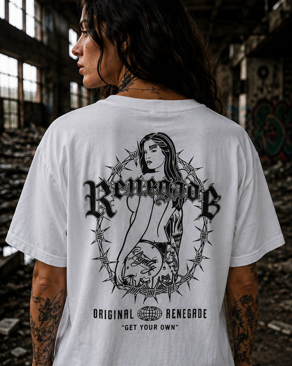 Trouble white heavyweight graphic tee back print close-up in derelict industrial setting