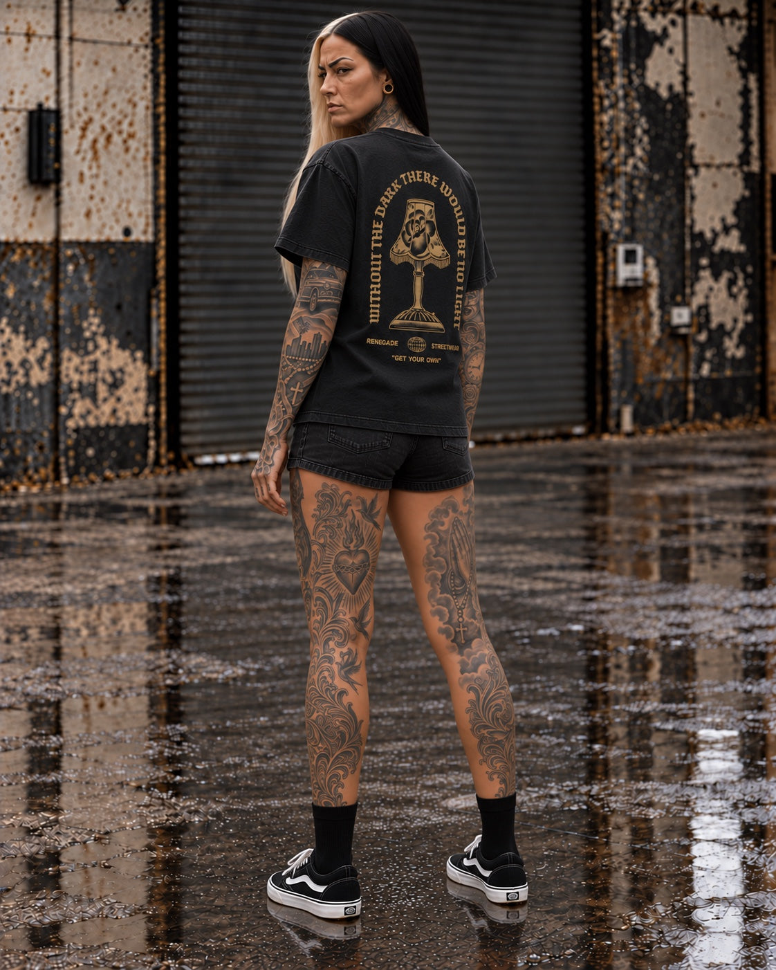 Without The Dark black graphic tee with mustard back print, three-quarter rear view